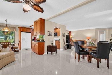 This exceptional villa home features wide golf course views and on Highland Lakes Executive Golf Course in Florida - for sale on GolfHomes.com, golf home, golf lot