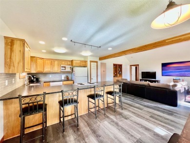 Welcome to low-maintenance luxury living in the heart of Mission on Polson Bay Golf Course - Championship Course in Montana - for sale on GolfHomes.com, golf home, golf lot