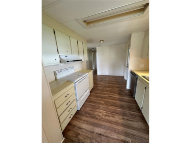 55 + gated golf course community Newly updated 2 bedroom 2 bath on Zellwood Station Country Club in Florida - for sale on GolfHomes.com, golf home, golf lot