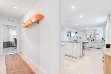 Welcome to 365 Caryota Court, located in the demanded and highly on Venetian Bay Golf Course in Florida - for sale on GolfHomes.com, golf home, golf lot