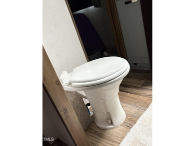 Beautiful cleared multi-use lot on the south side of Lake Royale on River Golf and Country Club at Lake Royale in North Carolina - for sale on GolfHomes.com, golf home, golf lot