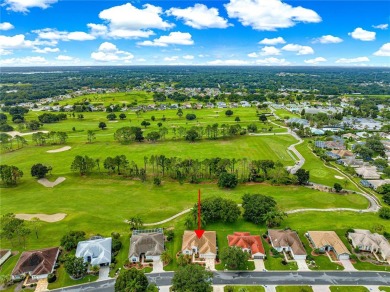 Golf Course location with panoramic views to a tree lined area on Eagle Ridge At Spruce Creek Country Club in Florida - for sale on GolfHomes.com, golf home, golf lot