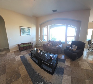 Tranquil Living in this single-story 2-bedroom 2 bath home with on Glen Ivy Golf Club in California - for sale on GolfHomes.com, golf home, golf lot