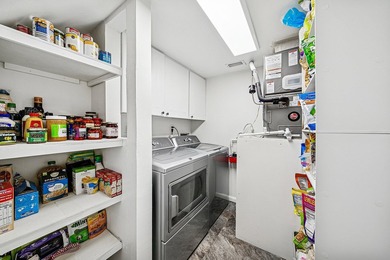 Look at this beautiful first-floor condo with a private garage on Boca Pointe Country Club in Florida - for sale on GolfHomes.com, golf home, golf lot