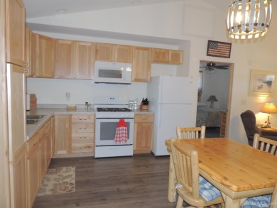 Just pack your bags and move right in to this immaculate totally on Nahma Club in Michigan - for sale on GolfHomes.com, golf home, golf lot
