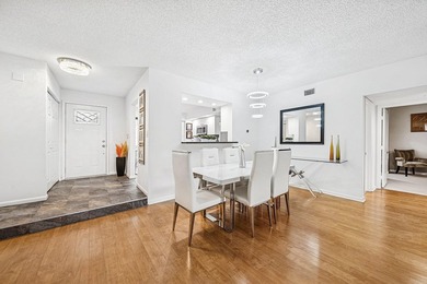 Look at this beautiful first-floor condo with a private garage on Boca Pointe Country Club in Florida - for sale on GolfHomes.com, golf home, golf lot