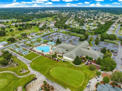 Golf Course location with panoramic views to a tree lined area on Eagle Ridge At Spruce Creek Country Club in Florida - for sale on GolfHomes.com, golf home, golf lot