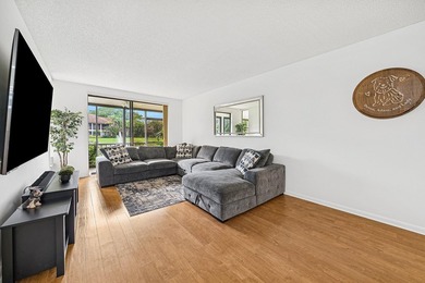 Look at this beautiful first-floor condo with a private garage on Boca Pointe Country Club in Florida - for sale on GolfHomes.com, golf home, golf lot