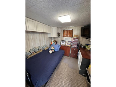 High end camping at its best is here.  Beautiful one bedroom on Captains Cove Golf and Yacht Club in Virginia - for sale on GolfHomes.com, golf home, golf lot