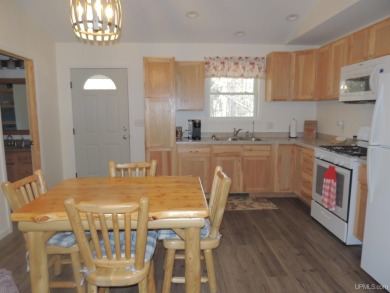 Just pack your bags and move right in to this immaculate totally on Nahma Club in Michigan - for sale on GolfHomes.com, golf home, golf lot