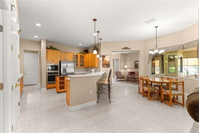 Golf Course location with panoramic views to a tree lined area on Eagle Ridge At Spruce Creek Country Club in Florida - for sale on GolfHomes.com, golf home, golf lot