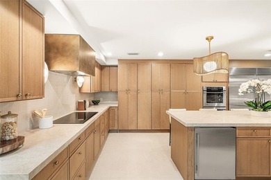 Nestled on a quiet cul-de-sac within the prestigious Seagate on Hamlet Country Club in Florida - for sale on GolfHomes.com, golf home, golf lot