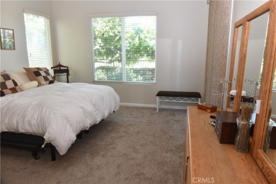 Tranquil Living in this single-story 2-bedroom 2 bath home with on Glen Ivy Golf Club in California - for sale on GolfHomes.com, golf home, golf lot