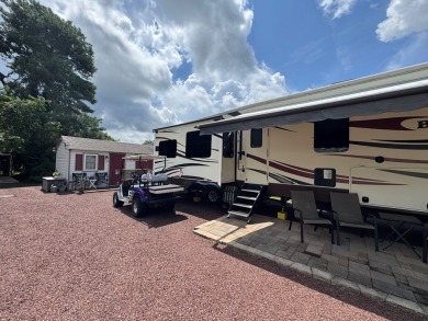 High end camping at its best is here.  Beautiful one bedroom on Captains Cove Golf and Yacht Club in Virginia - for sale on GolfHomes.com, golf home, golf lot
