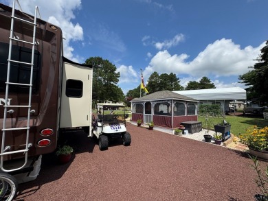 High end camping at its best is here.  Beautiful one bedroom on Captains Cove Golf and Yacht Club in Virginia - for sale on GolfHomes.com, golf home, golf lot