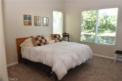 Tranquil Living in this single-story 2-bedroom 2 bath home with on Glen Ivy Golf Club in California - for sale on GolfHomes.com, golf home, golf lot