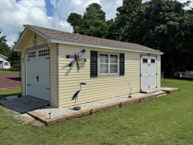 High end camping at its best is here.  Beautiful one bedroom on Captains Cove Golf and Yacht Club in Virginia - for sale on GolfHomes.com, golf home, golf lot