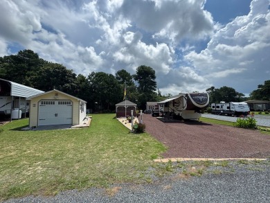 High end camping at its best is here.  Beautiful one bedroom on Captains Cove Golf and Yacht Club in Virginia - for sale on GolfHomes.com, golf home, golf lot