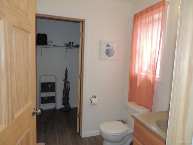 Just pack your bags and move right in to this immaculate totally on Nahma Club in Michigan - for sale on GolfHomes.com, golf home, golf lot