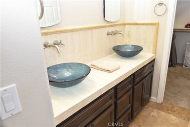 Tranquil Living in this single-story 2-bedroom 2 bath home with on Glen Ivy Golf Club in California - for sale on GolfHomes.com, golf home, golf lot