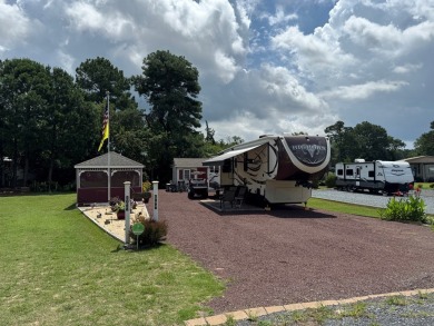 High end camping at its best is here.  Beautiful one bedroom on Captains Cove Golf and Yacht Club in Virginia - for sale on GolfHomes.com, golf home, golf lot