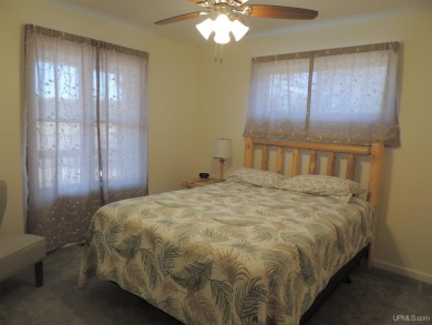Just pack your bags and move right in to this immaculate totally on Nahma Club in Michigan - for sale on GolfHomes.com, golf home, golf lot
