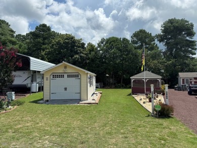 High end camping at its best is here.  Beautiful one bedroom on Captains Cove Golf and Yacht Club in Virginia - for sale on GolfHomes.com, golf home, golf lot