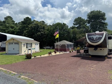 High end camping at its best is here.  Beautiful one bedroom on Captains Cove Golf and Yacht Club in Virginia - for sale on GolfHomes.com, golf home, golf lot