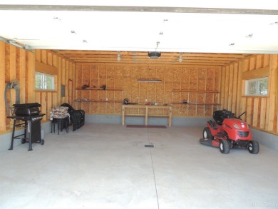 Just pack your bags and move right in to this immaculate totally on Nahma Club in Michigan - for sale on GolfHomes.com, golf home, golf lot