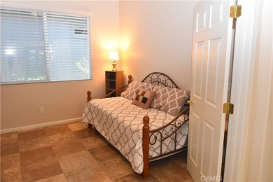 Tranquil Living in this single-story 2-bedroom 2 bath home with on Glen Ivy Golf Club in California - for sale on GolfHomes.com, golf home, golf lot
