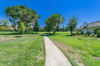 Discover your dream home in the beloved community of The on Villages Golf and Country Club in California - for sale on GolfHomes.com, golf home, golf lot