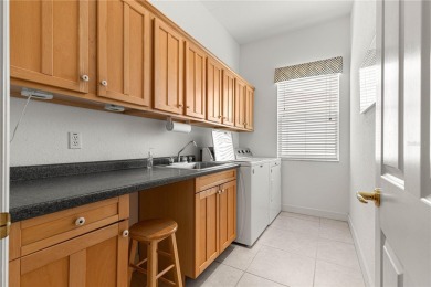 Golf Course location with panoramic views to a tree lined area on Eagle Ridge At Spruce Creek Country Club in Florida - for sale on GolfHomes.com, golf home, golf lot