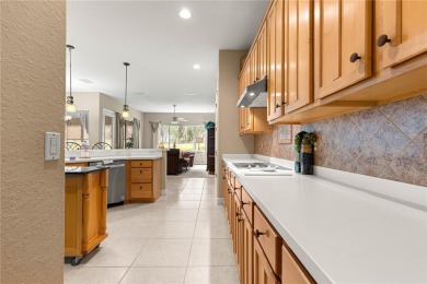 Golf Course location with panoramic views to a tree lined area on Eagle Ridge At Spruce Creek Country Club in Florida - for sale on GolfHomes.com, golf home, golf lot