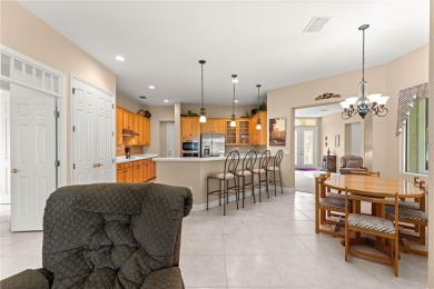 Golf Course location with panoramic views to a tree lined area on Eagle Ridge At Spruce Creek Country Club in Florida - for sale on GolfHomes.com, golf home, golf lot