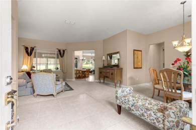 Golf Course location with panoramic views to a tree lined area on Eagle Ridge At Spruce Creek Country Club in Florida - for sale on GolfHomes.com, golf home, golf lot