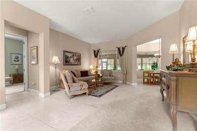 Golf Course location with panoramic views to a tree lined area on Eagle Ridge At Spruce Creek Country Club in Florida - for sale on GolfHomes.com, golf home, golf lot