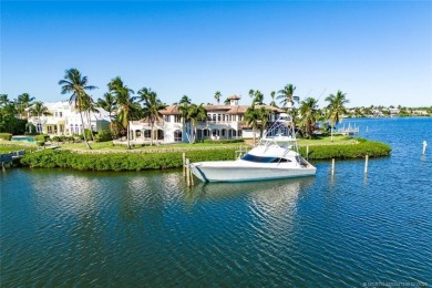 This 8,000-sq.-ft. Mediterranean masterpiece in exclusive on Sailfish Point Golf Club, Inc. in Florida - for sale on GolfHomes.com, golf home, golf lot