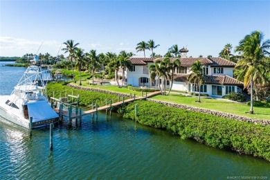 This 8,000-sq.-ft. Mediterranean masterpiece in exclusive on Sailfish Point Golf Club, Inc. in Florida - for sale on GolfHomes.com, golf home, golf lot