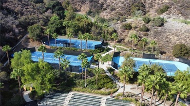 Tranquil Living in this single-story 2-bedroom 2 bath home with on Glen Ivy Golf Club in California - for sale on GolfHomes.com, golf home, golf lot