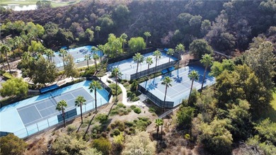 Tranquil Living in this single-story 2-bedroom 2 bath home with on Glen Ivy Golf Club in California - for sale on GolfHomes.com, golf home, golf lot