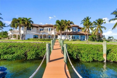 This 8,000-sq.-ft. Mediterranean masterpiece in exclusive on Sailfish Point Golf Club, Inc. in Florida - for sale on GolfHomes.com, golf home, golf lot