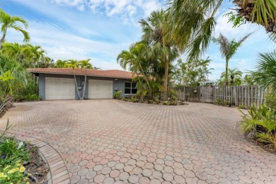 WONDERFUL FLORIDA STYLE COUNTRY CLUB SHORES canal FRONT home and on Links on Longboat Golf Club in Florida - for sale on GolfHomes.com, golf home, golf lot