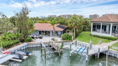 WONDERFUL FLORIDA STYLE COUNTRY CLUB SHORES canal FRONT home and on Links on Longboat Golf Club in Florida - for sale on GolfHomes.com, golf home, golf lot
