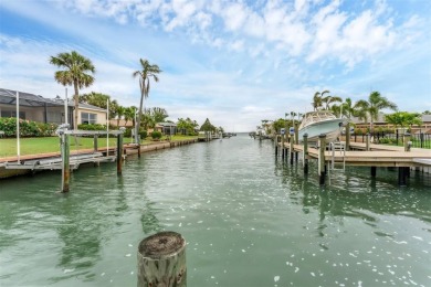 WONDERFUL FLORIDA STYLE COUNTRY CLUB SHORES canal FRONT home and on Links on Longboat Golf Club in Florida - for sale on GolfHomes.com, golf home, golf lot