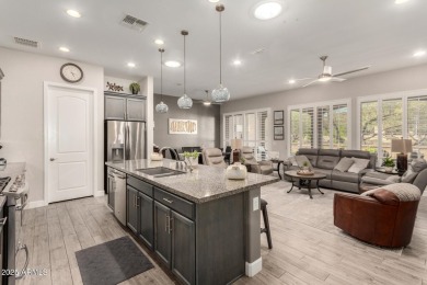 This exceptional & well-maintained home is situation on premium on Tuscany Falls At Pebble Creek in Arizona - for sale on GolfHomes.com, golf home, golf lot