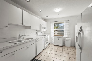 Welcome home to this charming second-floor condo nestled in the on Tara Golf and Country Club in Florida - for sale on GolfHomes.com, golf home, golf lot