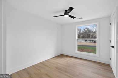 OPEN HOUSE SAT 3/7 FROM 12-2PM!! COMPLETELY REIMAGINED FROM THE on Canongate At Flat Creek Club in Georgia - for sale on GolfHomes.com, golf home, golf lot