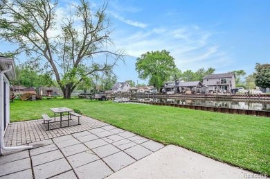 Fall in love with lake living! Just a short walk to Lake Erie on Lake Erie Metropark Golf Course in Michigan - for sale on GolfHomes.com, golf home, golf lot