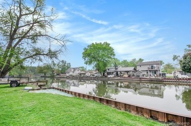 Fall in love with lake living! Just a short walk to Lake Erie on Lake Erie Metropark Golf Course in Michigan - for sale on GolfHomes.com, golf home, golf lot