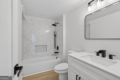 OPEN HOUSE SAT 3/7 FROM 12-2PM!! COMPLETELY REIMAGINED FROM THE on Canongate At Flat Creek Club in Georgia - for sale on GolfHomes.com, golf home, golf lot